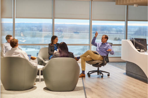 This image represents doctors and leadership having a meeting
